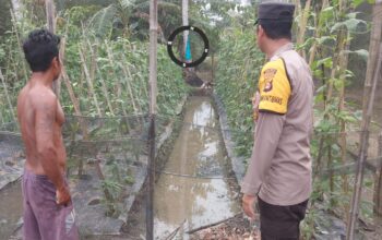 Bhabinkamtibmas Ajak Warga Banyuasin Aktifkan Lahan demi Ketahanan Pangan Nasional
